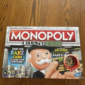 Hasbro Monopoly Crooked Cash Game - Red and Green